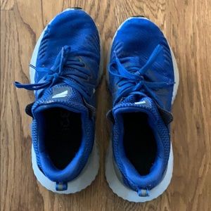 Blue Adidas tennis shoes